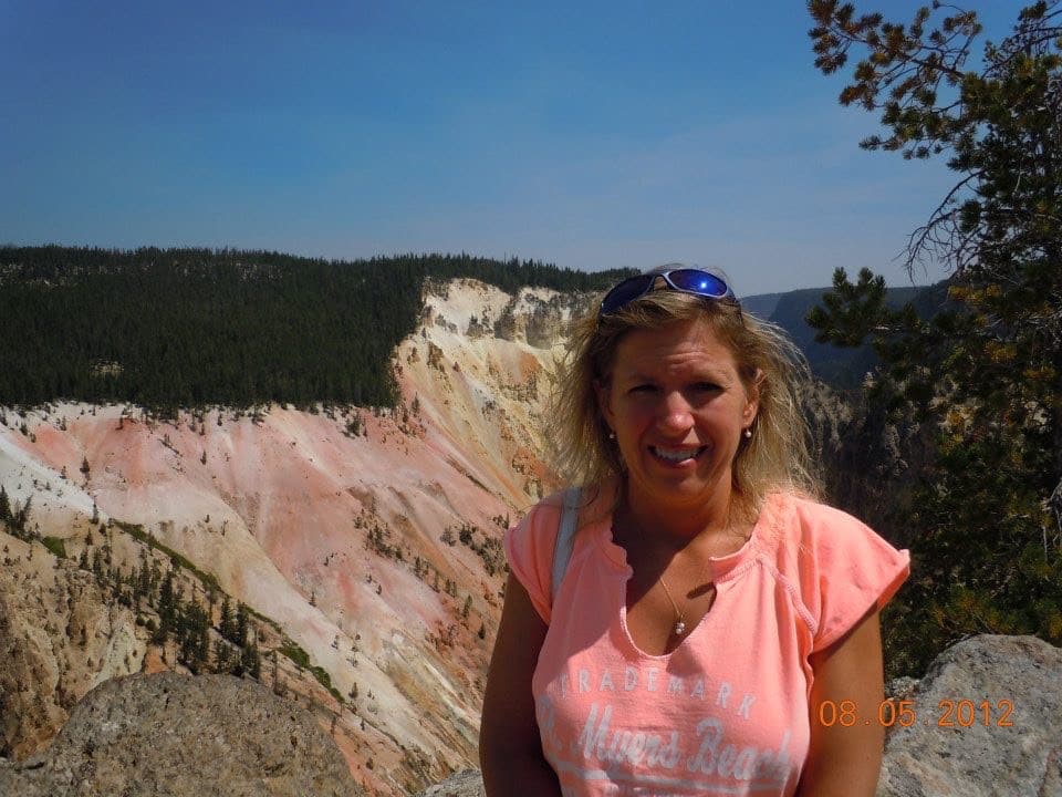 Tammy Horvath in front of the Grand Canyon of Yellowstone Tammy Horvath in front of the Grand Canyon of Yellowstone